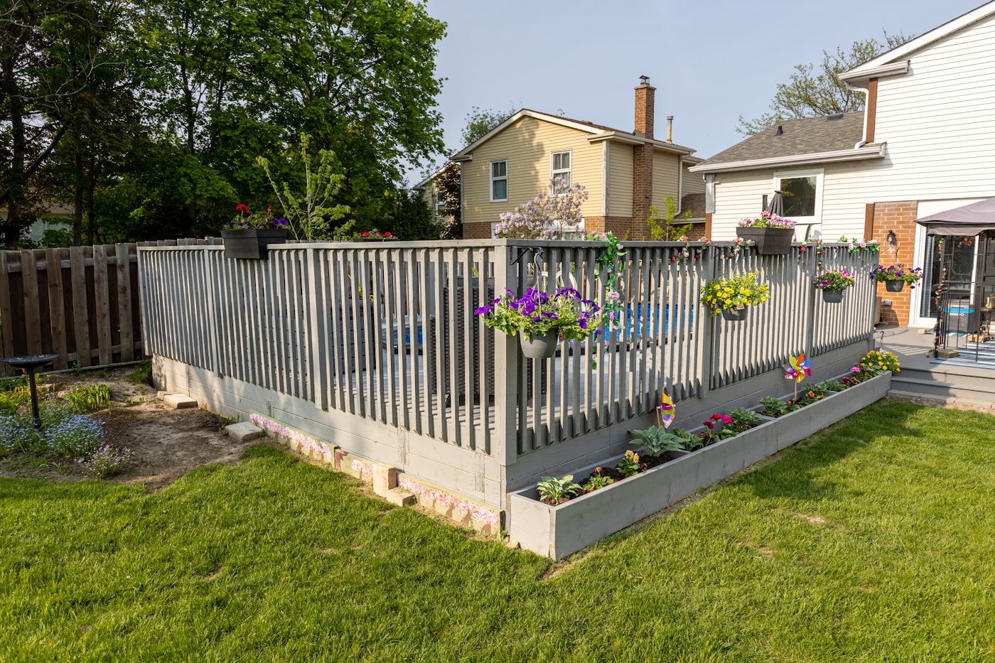 Wood fence installed along a residential backyard